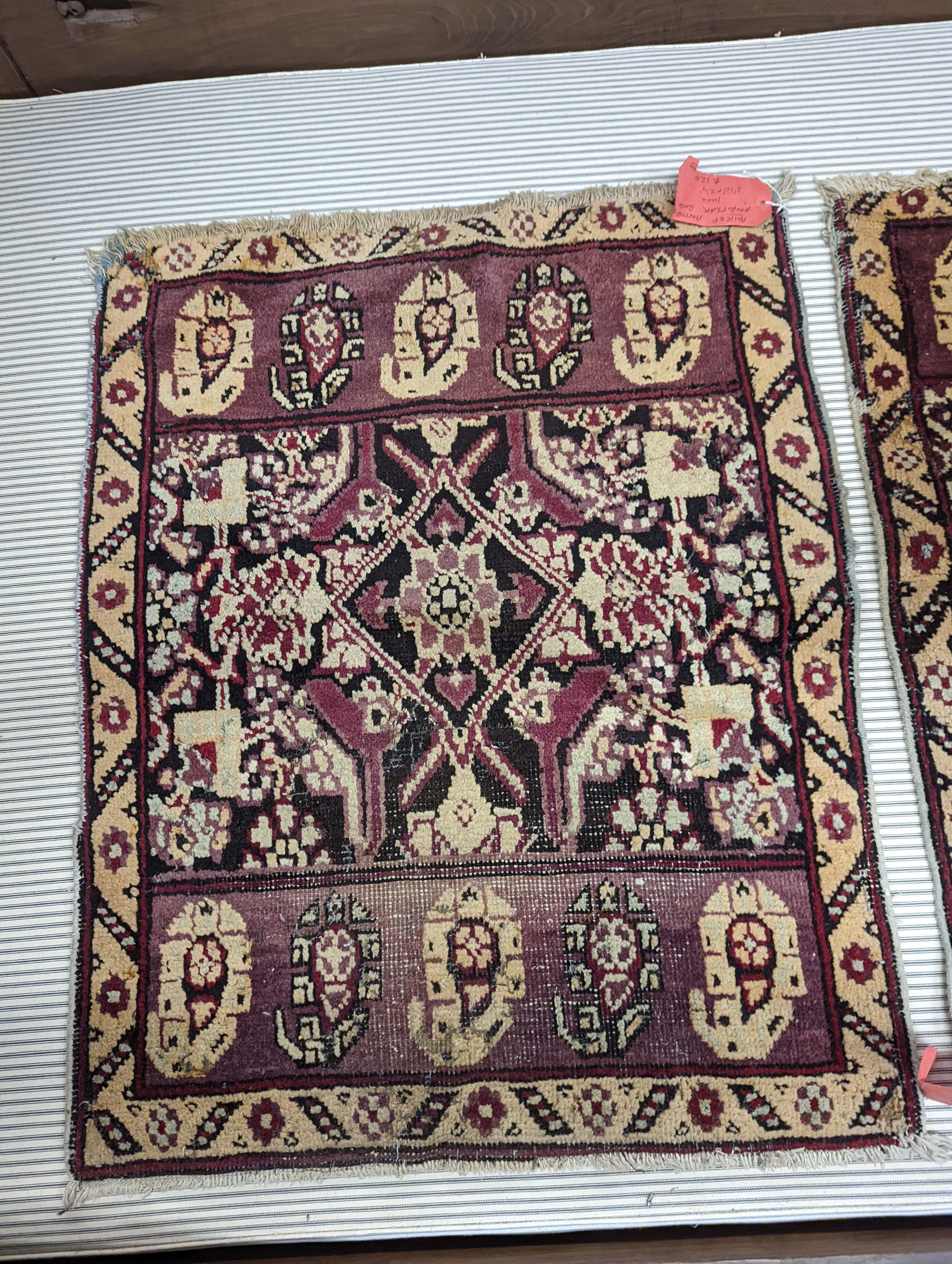 A pair of antique Amritzar rugs, 81 x 66cm